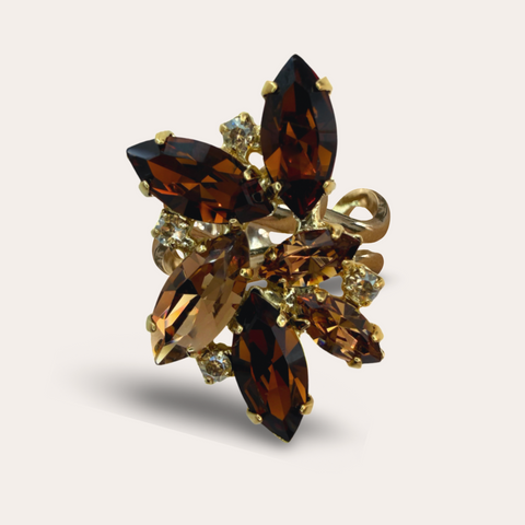 Ring with 10 brown crystals
