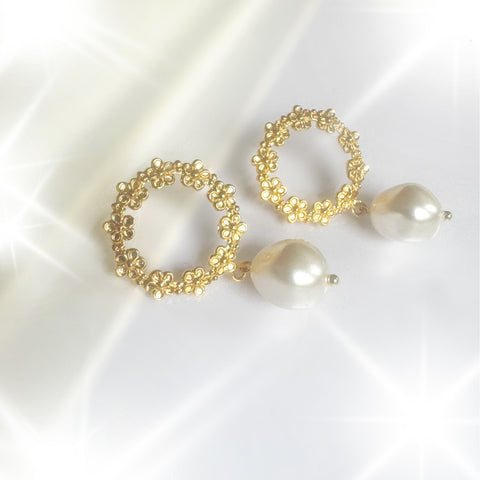 Sale; Bloem-oorstekers met parels