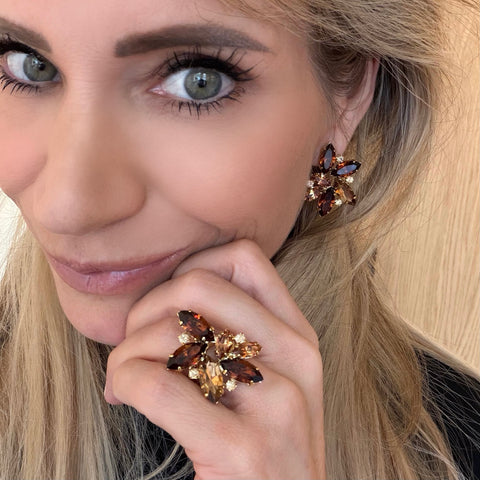 Ring bezet met olijfgroene kristallen