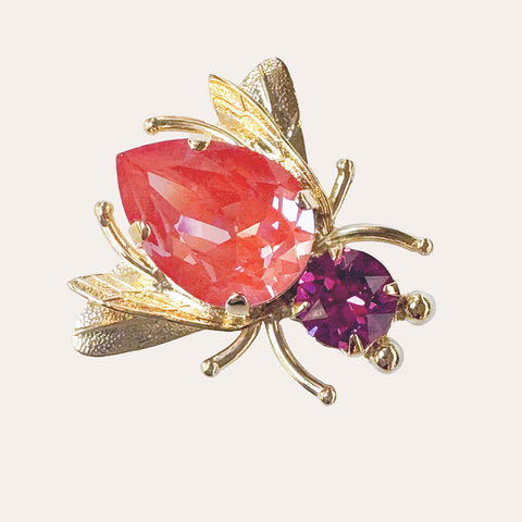 Vlieg broche met fuchsia en oranje kristallen