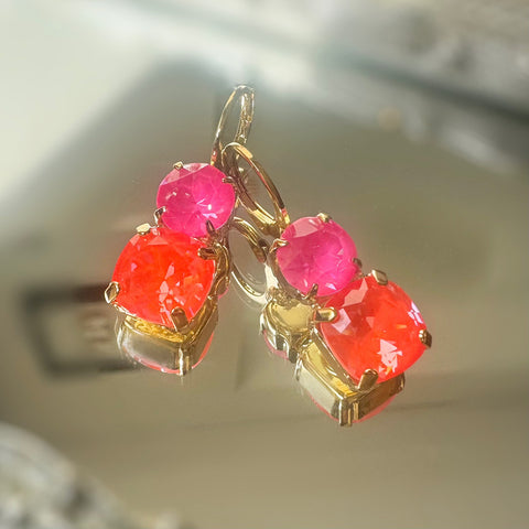 Hoop earrings with bright pink and orange crystals