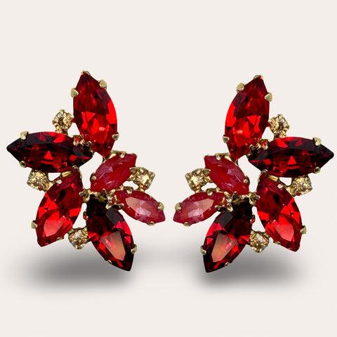 Large stud earrings set with red crystals