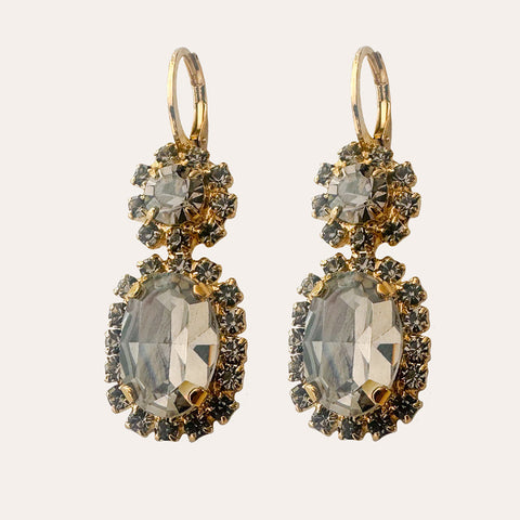 Green earrings with shiny crystals