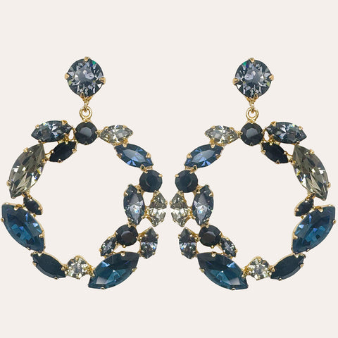 Stud earrings with soft blue crystals and a pearl