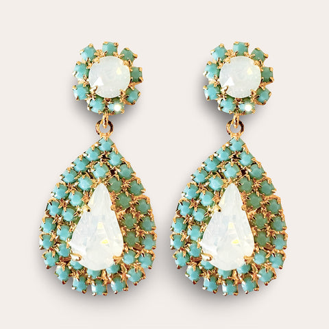 Notify me: Oorstekers met wit opaal druppels omringd door turquoise steentjes