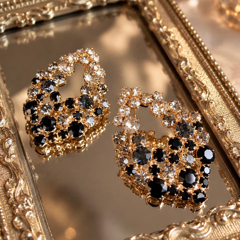 Oval earrings with many black Swarovski crystals