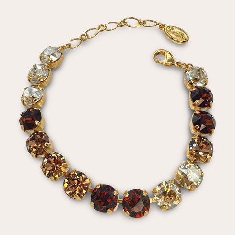 Gold bracelet with red Swarovski crystals