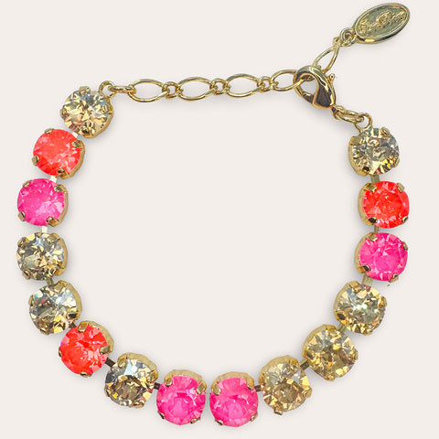 Gold bracelet with pink/orange Swarovski crystals