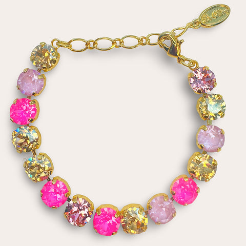 Gold bracelet with pink/orange Swarovski crystals