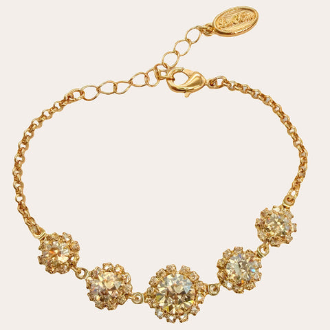 Gold bracelet with pink/orange Swarovski crystals