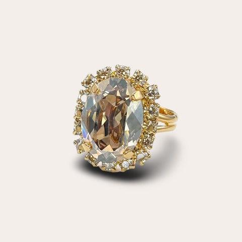 Ring met glimmende gouden kristalletjes