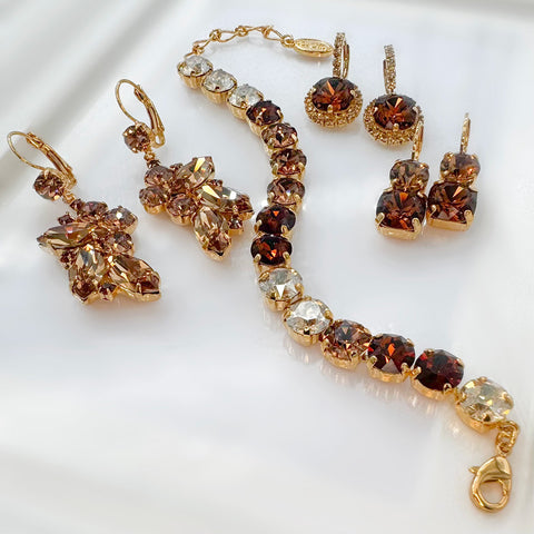 Gold bracelet with red Swarovski crystals